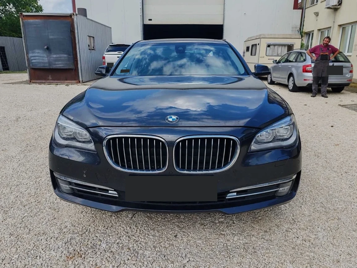BMW 740d sedan — photograph from the original BPV booklet (page 133, image 1)